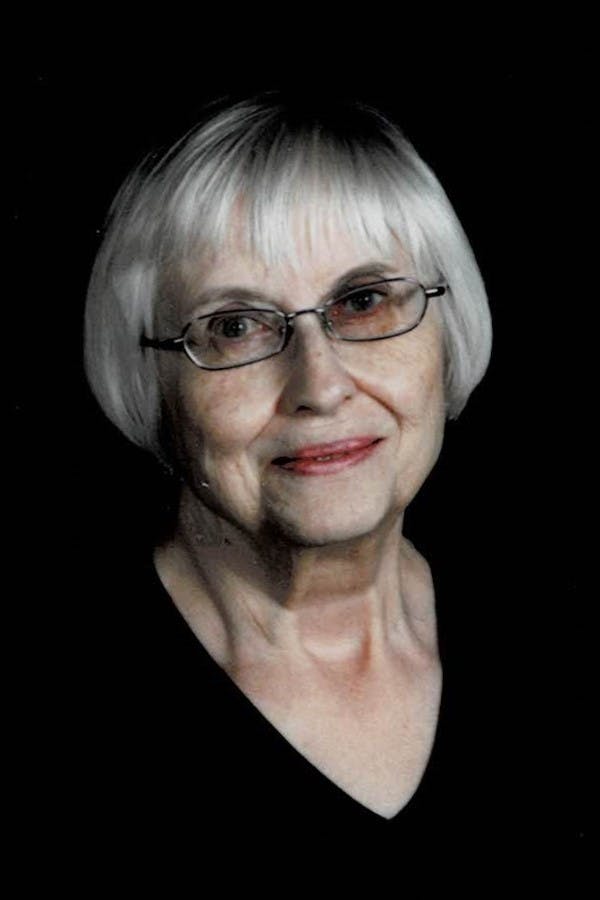 A portrait photograph of Mary R. Weisel
